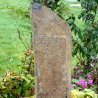 Basaltic Column Pet Memorial with Hand Carved Letters for Zeb in the Garden