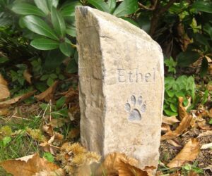 basaltic column pet memorial with paw print motif for ethel