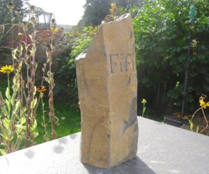 basaltic pet memorial column with handcarved letters for fifi