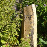 Basaltic Column Pet Memorial with Hand Carved Letters for Fifi Trixabelle in the Garden