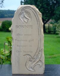 Rustic Limestone Pet Memorial with Hand Carved Flower Motif for Bonnie